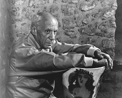 Picasso leans on art vase