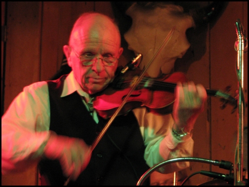 Playing the fiddle at his CD release party